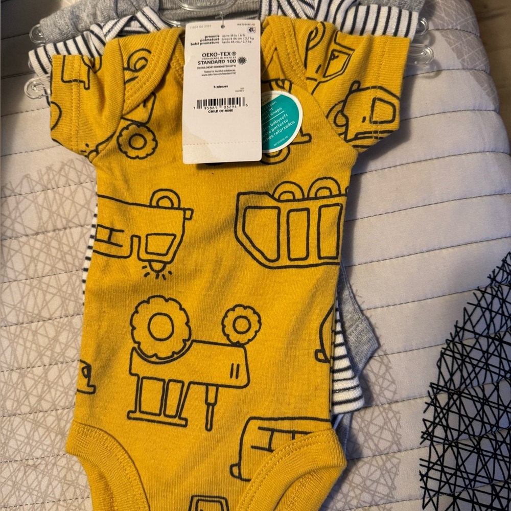Yellow Baby Onesie with Vehicle Print